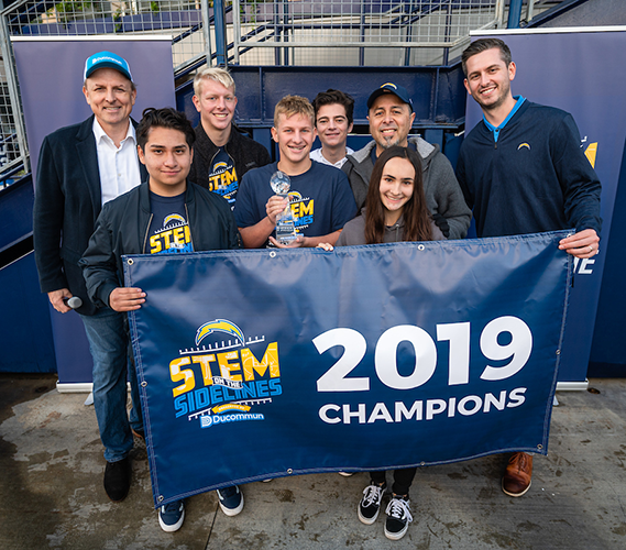 Samueli School alumnus Ed Hernandez, back row second from right, led the Tustin High School team to its second consecutive victory.