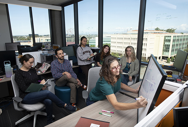 Naomi Chesler, Chancellor’s Inclusive Excellence Professor, works with students in the Edwards Lifesciences Center for Advanced Cardiovascular Technology. Steve Zylius/UCI