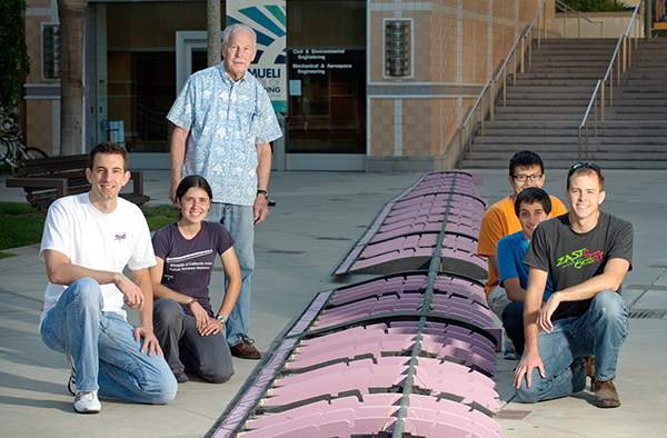 Liebeck, standing, with UCI’s human-powered airplane team in 2014, retired last month from Boeing but will continue to teach and mentor university students. Steve Zylius / UCI