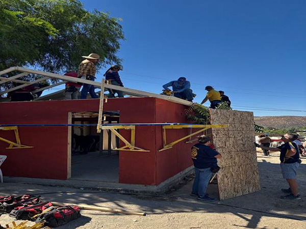 Engineers Without Borders students work alongside other volunteers in Tijuana, Mexico to build a house.