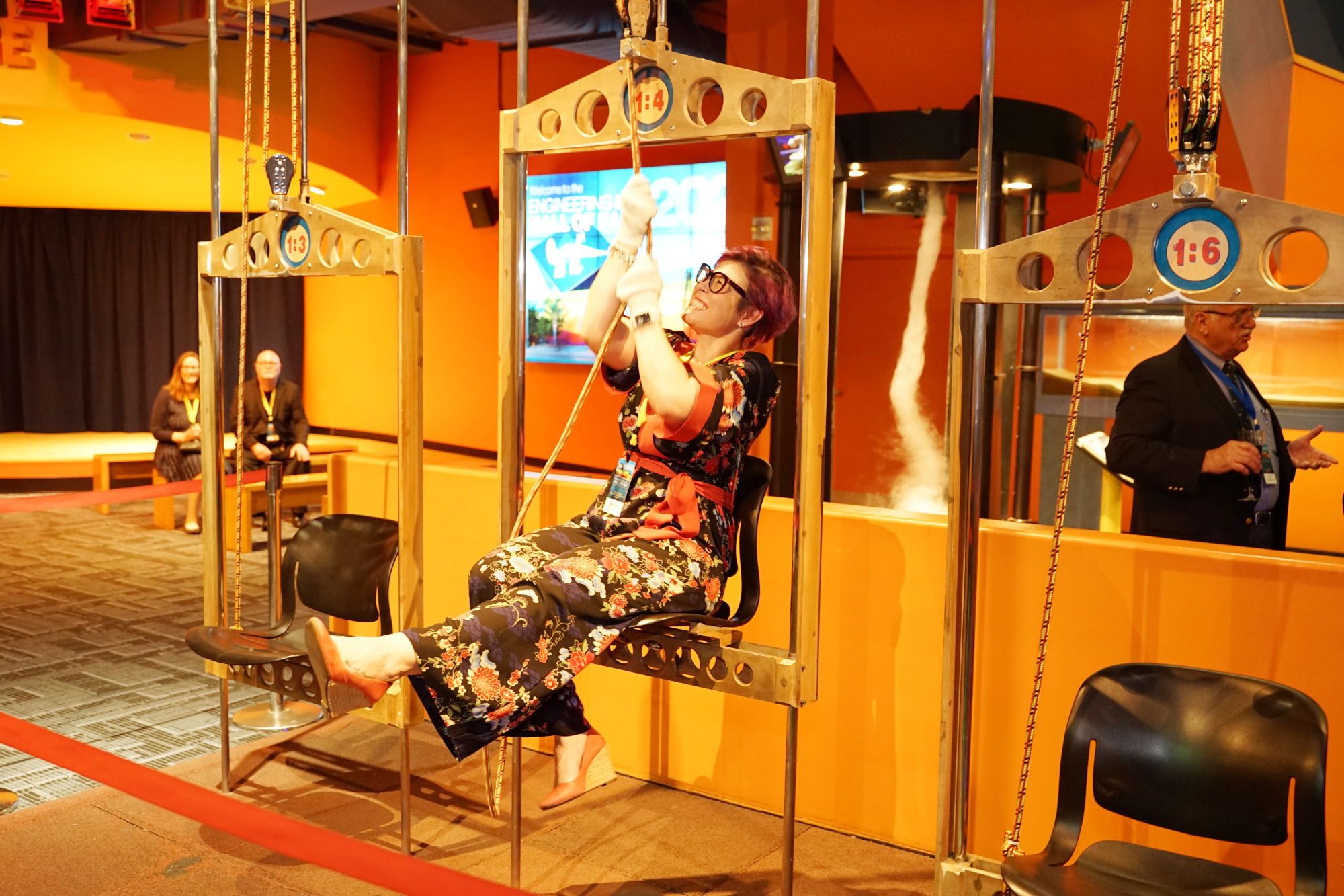 A guest tries out an exhibit at the Discover Cube Orange County during the 2020 Hall of Fame Celebration.