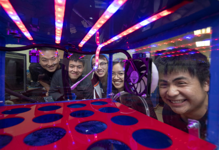 Quoc-Viet Dang (left), UCI assistant professor of teaching in electrical engineering & computer science, is faculty mentor for the ZotPonics undergraduate research project. Team members are (from right) Owen Kai Yang, Kathy M. Nguyen, Sidney Lau and Jason Chour Lim. Steve Zylius / UCI