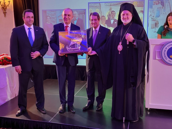 Republic of Cyprus President Nicos Anastasiades, Archbishop of North America Elpidophoros, and FCAO President Kyriacos Papastylianou present Kyriacos A. Athanasiou the Lifetime Achievement Award. From left are Papastylianou, Athanasiou, Anastasiades and Elpidophoros.