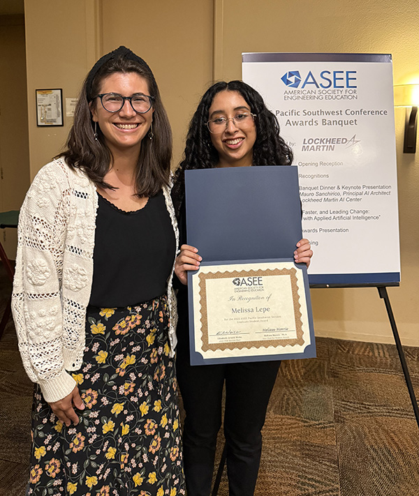 Melissa Lepe (right) and her co-adviser Natascha Buswell (left) pose at the American Society of Engineering Education Pacific Southwest Regional Conference, where Lepe was recognized with an Outstanding Graduate Student Award.