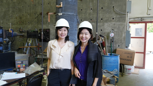 UCI civil engineering professor Mo Li (left) and Natalie Tso (right) during a recording of The Lab Beat at Li's cement lab. 