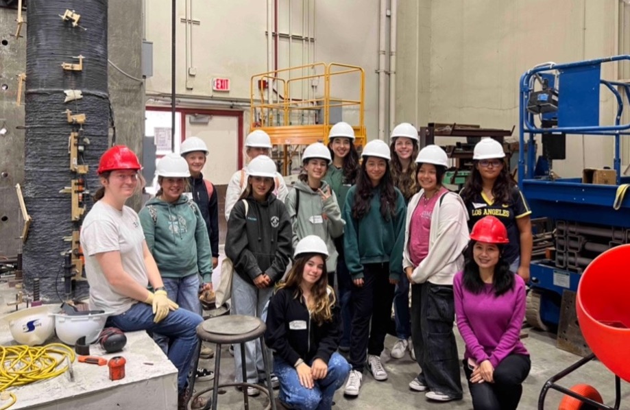 Middle and high school students learning about ocean infrastructure and support for marine life from graduate student Kathryn Jones and Professor Mo Li in the SETH Lab