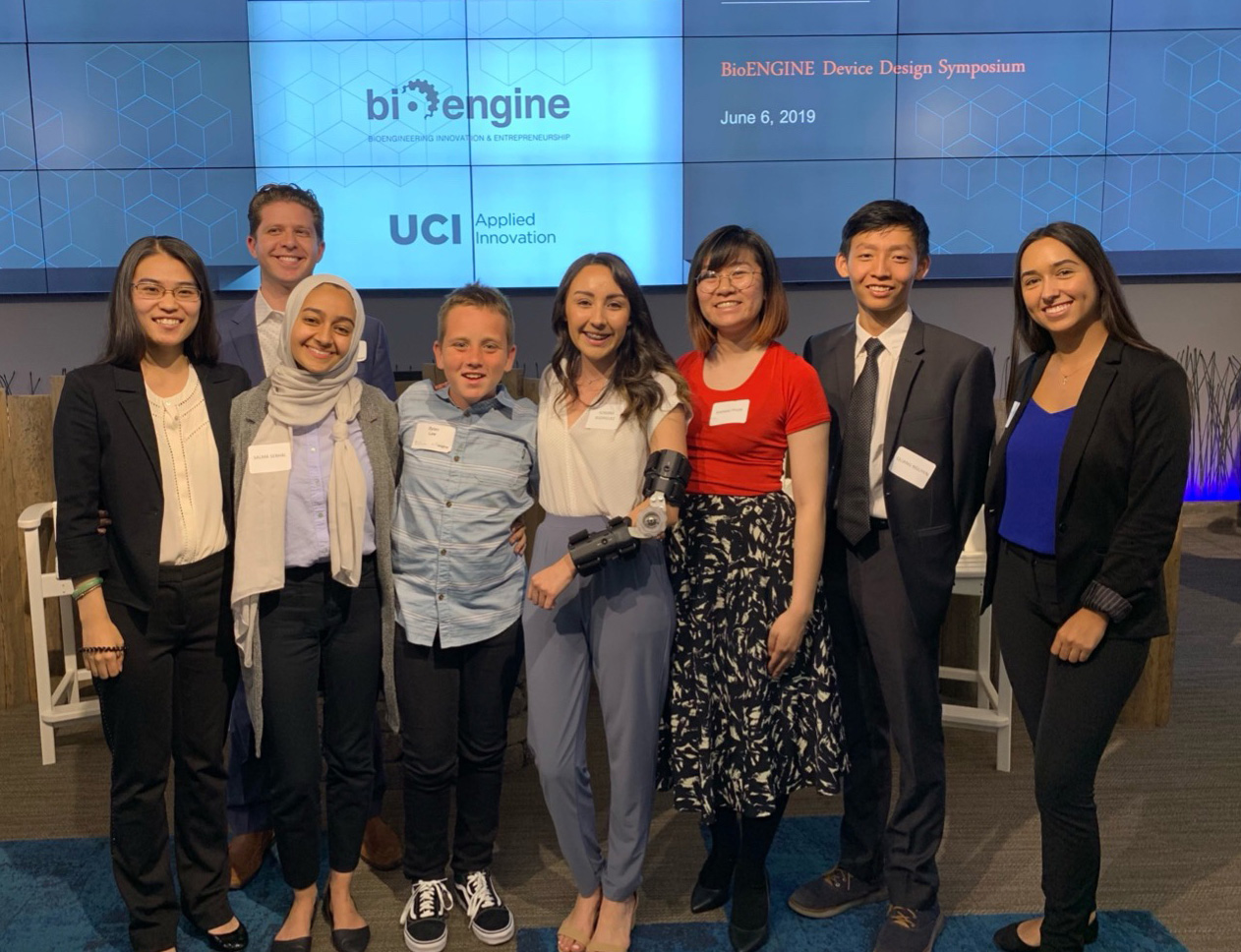 The UCI BioEngine team poses with Dr. Sharief Taraman and Dylan Law at a UCI Beall Applied Innovation presentation. From left: UCI biomedical engineering student Tia Li, Dr. Sharief Taraman, Salma Serhal, Dylan Law, Adriana Rodriguez,  Kimmai Phan, Quang Nguyen and Taylor White at a UCI Beall Applied Innovation presentation.