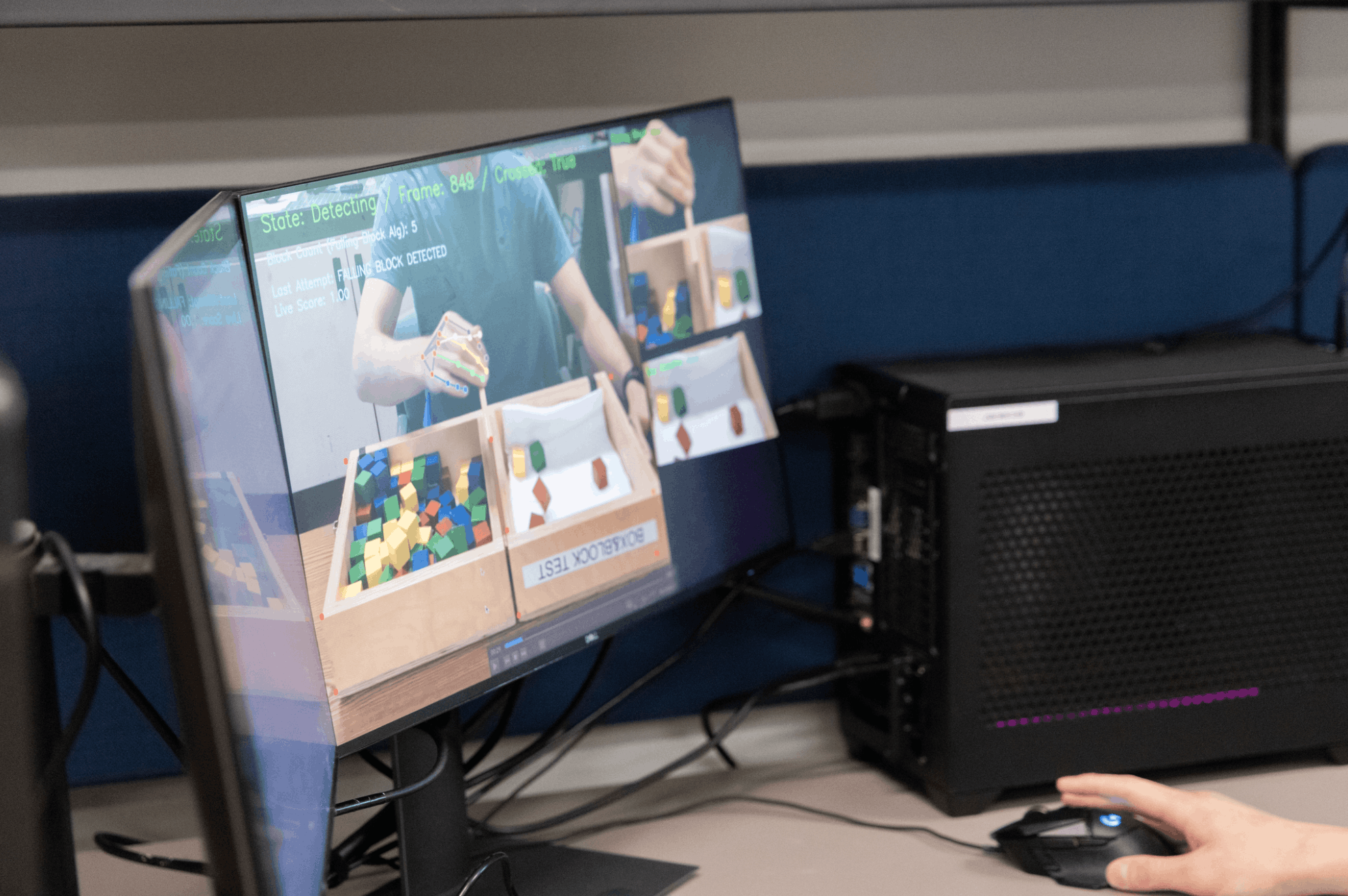  C-MoRe tracks when a block is moved over the barrier and dropped on the other side. (Elena Troncoso/UC Davis)