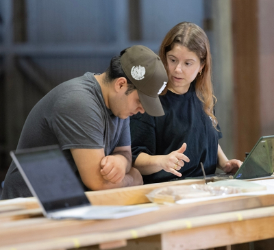 Project manager, wings lead, and mechanical engineering student Silvia Tinelli speaks with Jonathan Oropeza Photo: Flying Leathernecks Heritage Foundation