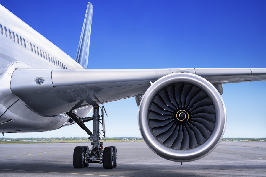 Image of passenger jet and turbine.